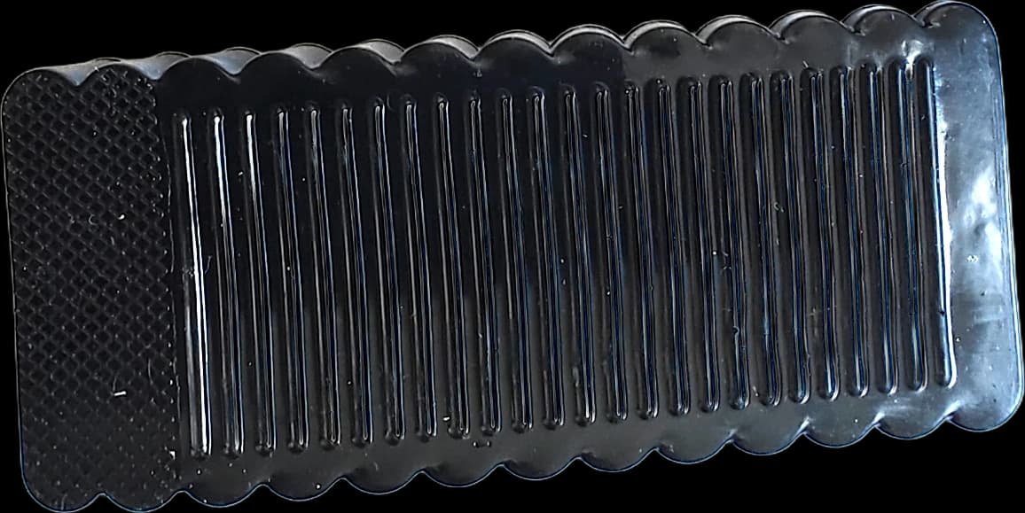 Black rubber door wedge stop with ribbed grip