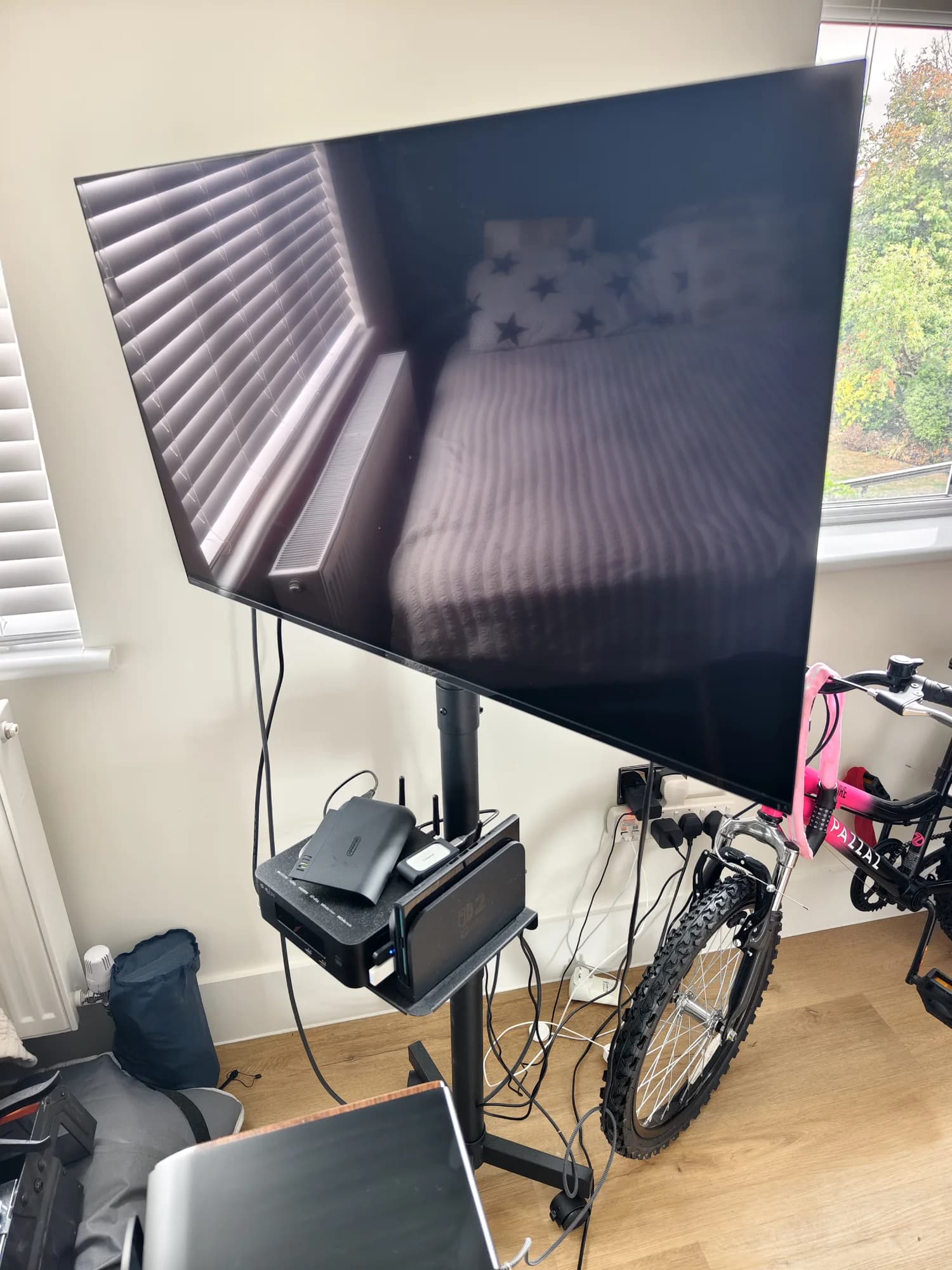 Mobile TV stand on wheels